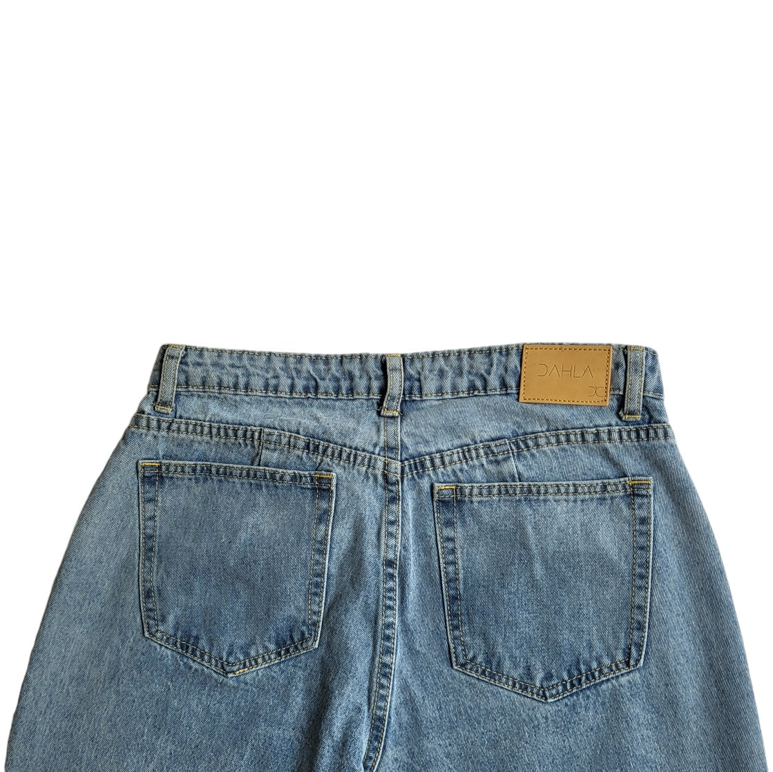 Jean mujer Dahla azul con rotos tiro medio wide leg talla 8